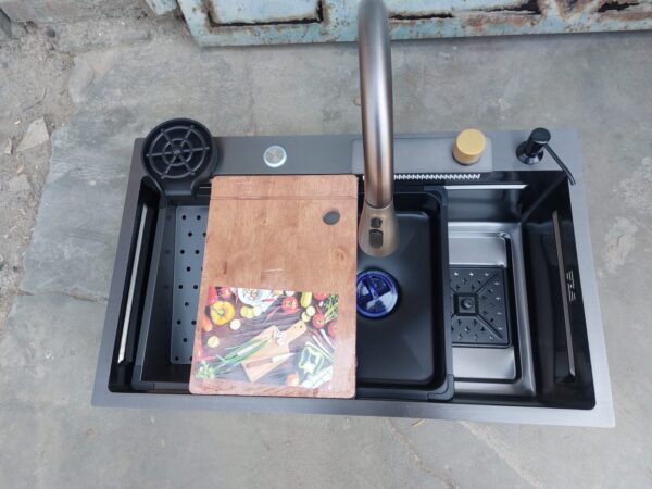 Stainless steel kitchen sink with modern faucet, ideal for contemporary kitchens,