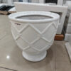 "Image of a colorful flower pot (gamla) with vibrant blooms, adding a pop of color to any space,