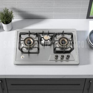 RINO RS979 Gas Stove (Brass),"Stainless steel kitchen stove with three burners and control knobs, illuminated by overhead lighting,